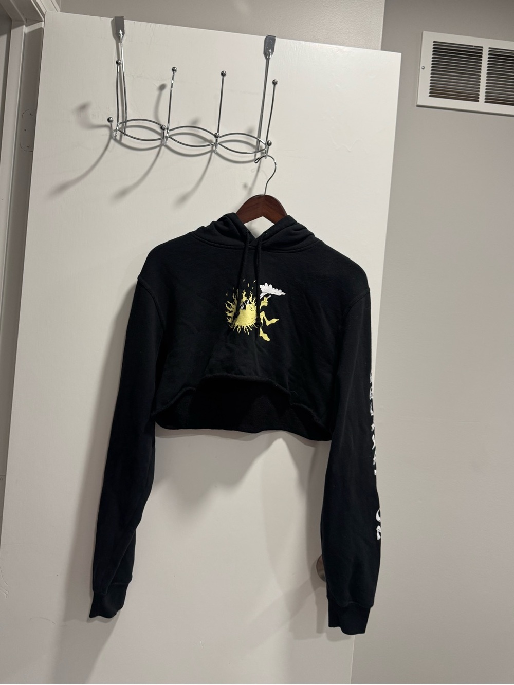 Mid2010s Urban Outfitters Boho Cropped Black Hoodie with Yellow Sun Graphic